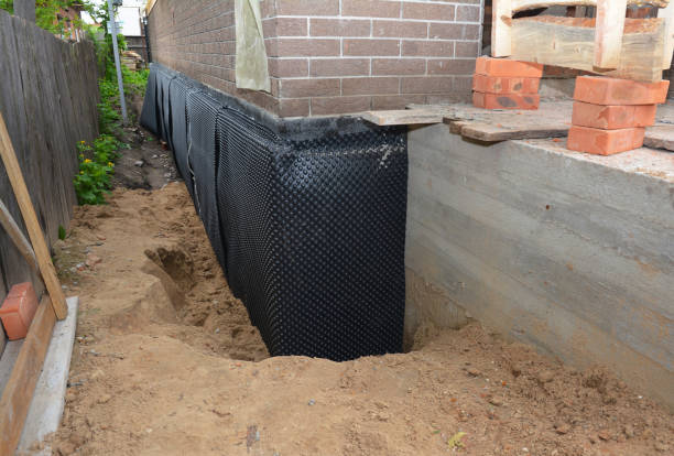 Happy homeowners after waterproofing job in Lynnville